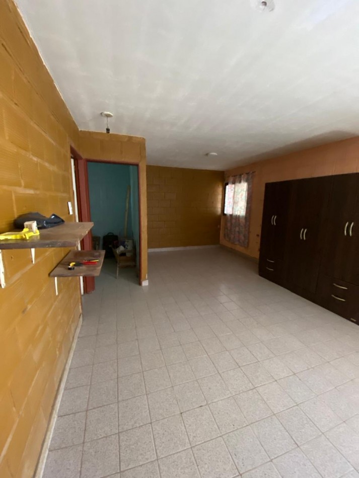 CASA DE DOS DORMITORIOS EN BARRIO 188 VIVIENDAS EN VILLA CARMELA