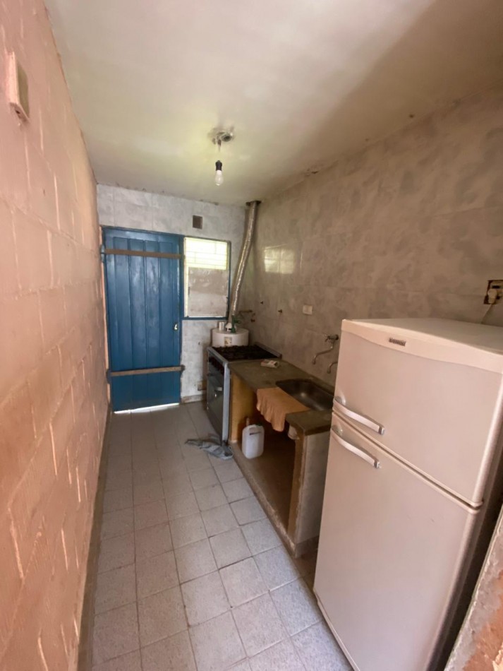 CASA DE DOS DORMITORIOS EN BARRIO 188 VIVIENDAS EN VILLA CARMELA