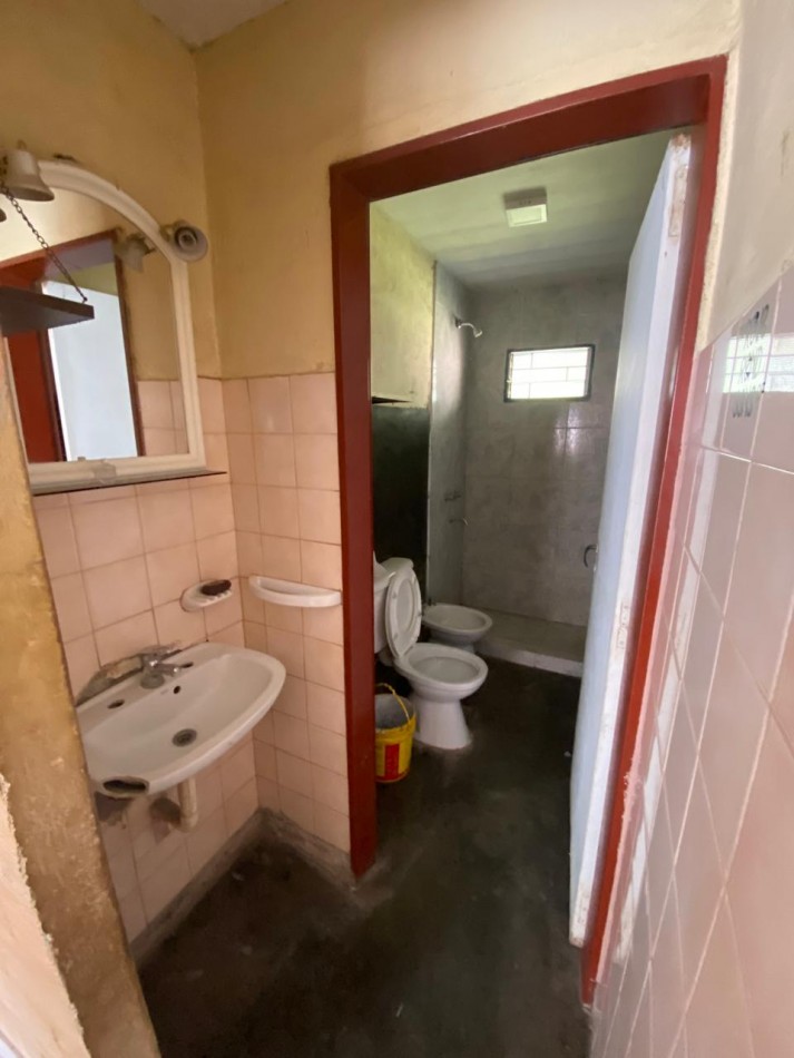 CASA DE DOS DORMITORIOS EN BARRIO 188 VIVIENDAS EN VILLA CARMELA