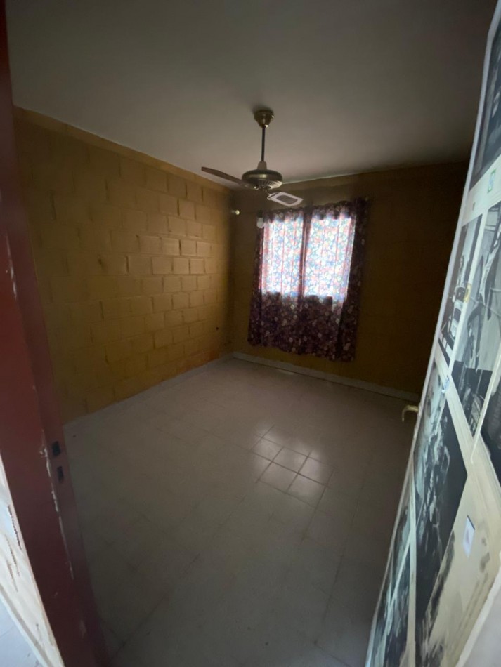 CASA DE DOS DORMITORIOS EN BARRIO 188 VIVIENDAS EN VILLA CARMELA