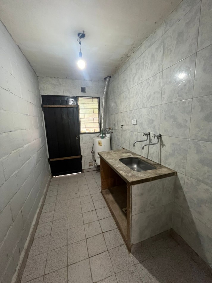CASA DE DOS DORMITORIOS EN BARRIO 188 VIVIENDAS EN VILLA CARMELA
