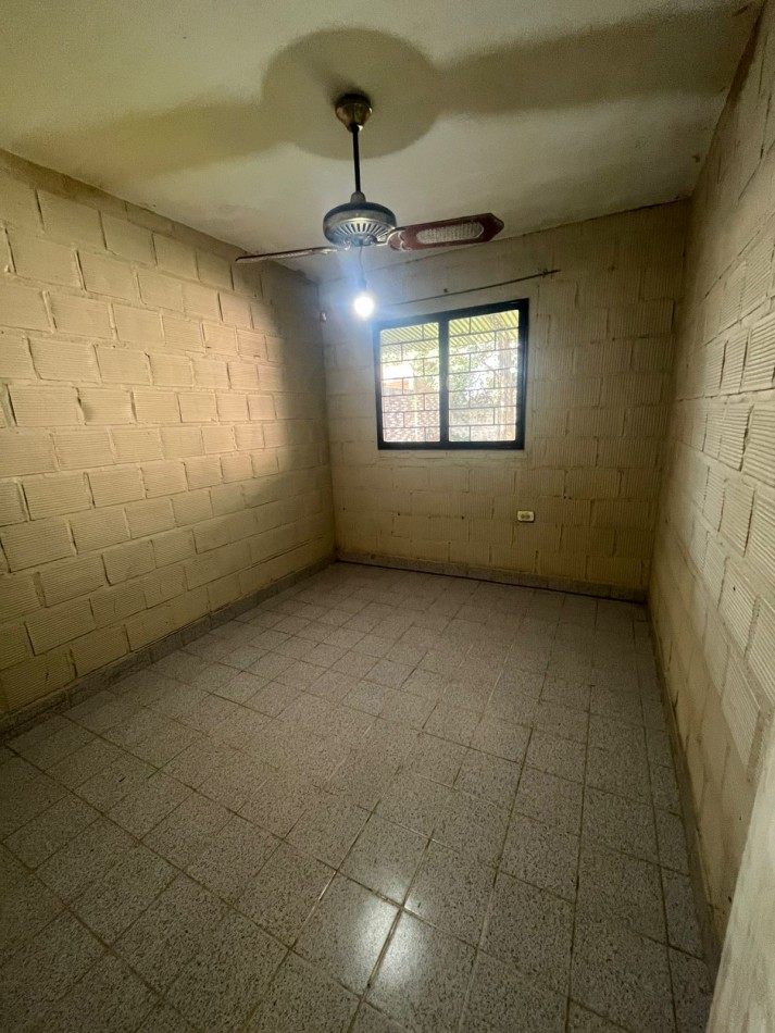 CASA DE DOS DORMITORIOS EN BARRIO 188 VIVIENDAS EN VILLA CARMELA