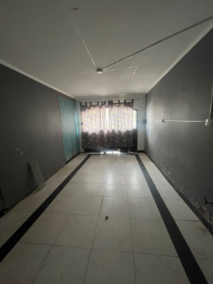 DEPARTAMENTO DE DOS DORMITORIOS EN CRISOSTOMO CASI AVENIDA COLON CON COCHERA Y PATIO